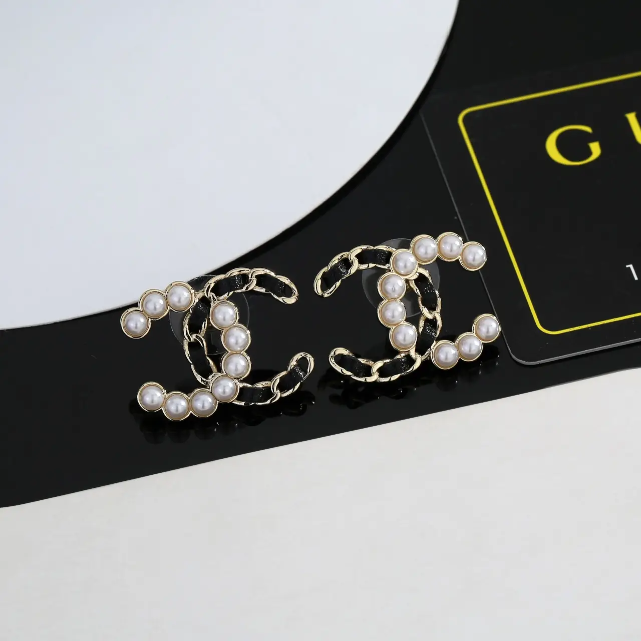 Chanel Black Leather Pearl Earrings