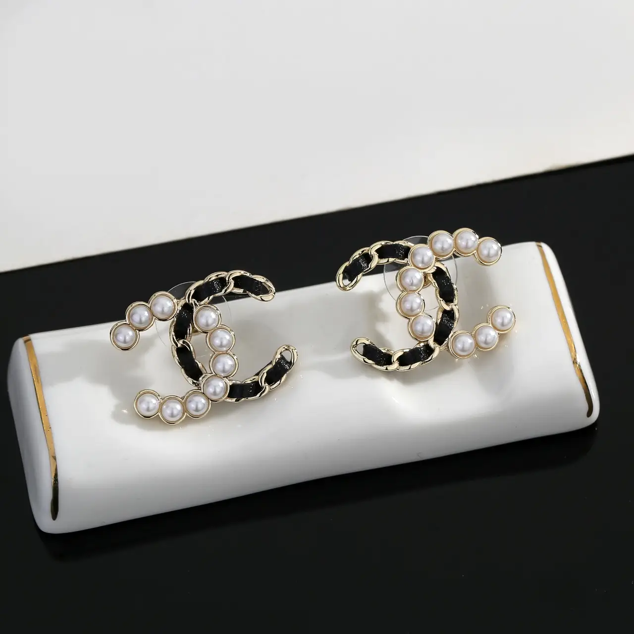 Chanel Black Leather Pearl Earrings