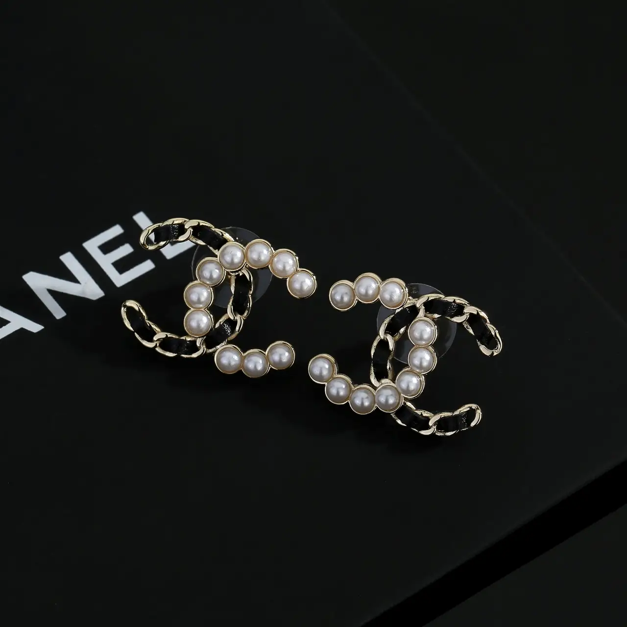 Chanel Black Leather Pearl Earrings