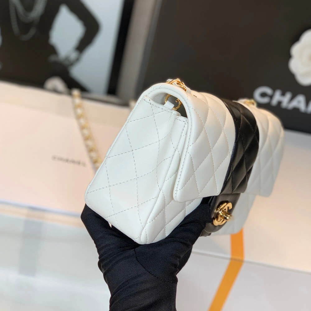 Bold CHANEL MINI FLAP BAG 1215