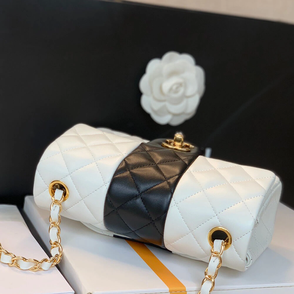 Bold CHANEL MINI FLAP BAG 1215