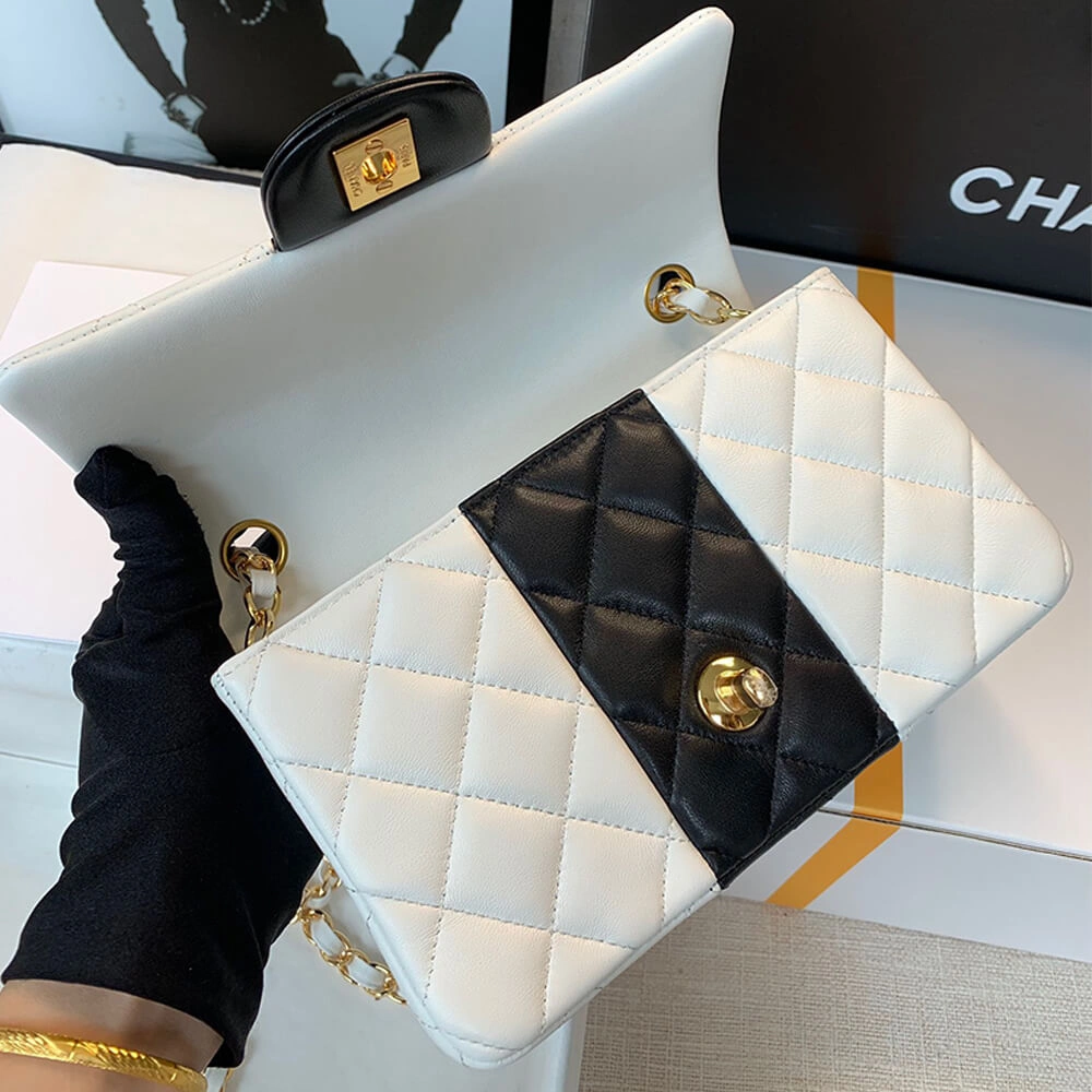 Bold CHANEL MINI FLAP BAG 1215
