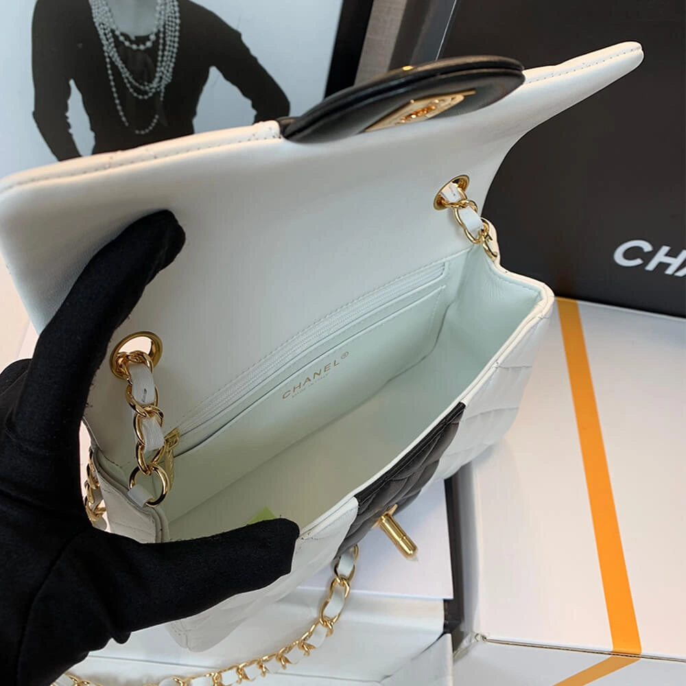 Bold CHANEL MINI FLAP BAG 1215