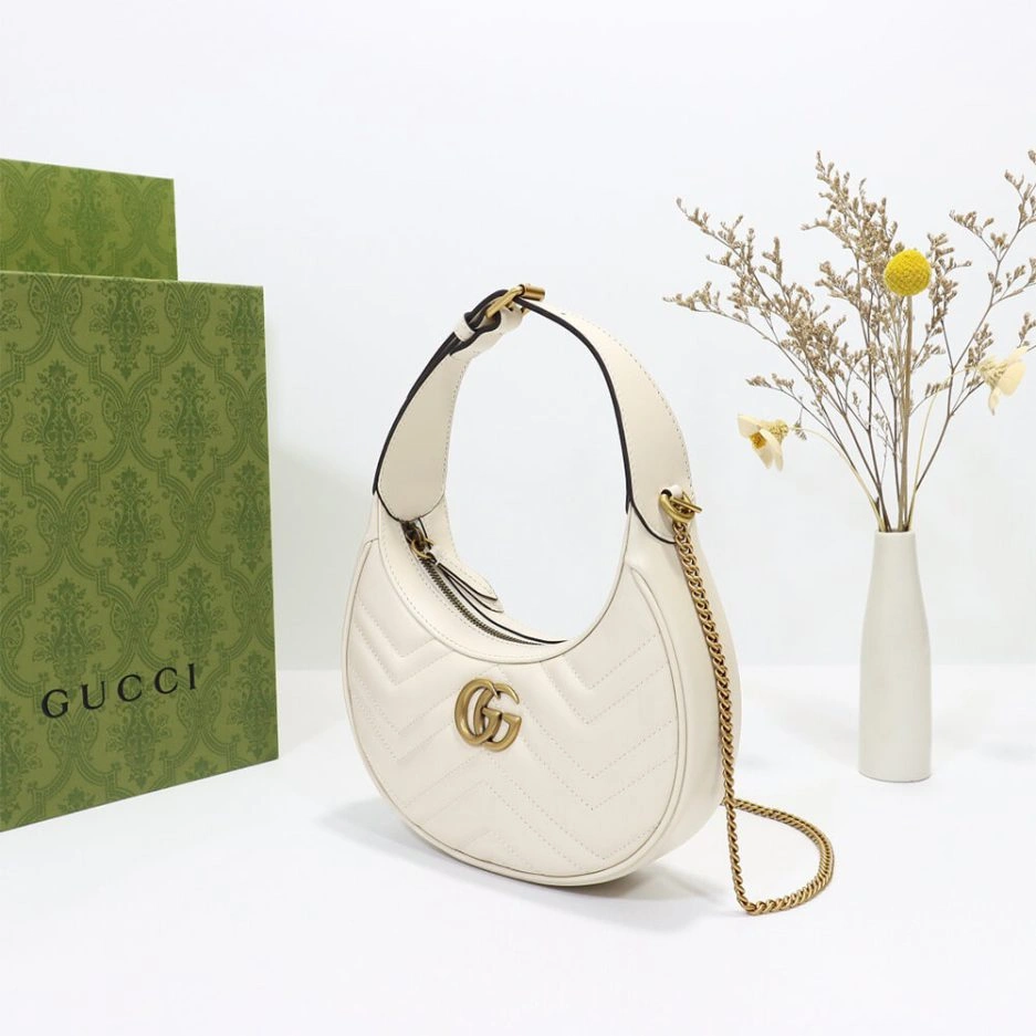 GG Marmont half-moon-shaped mini bag Original 858
