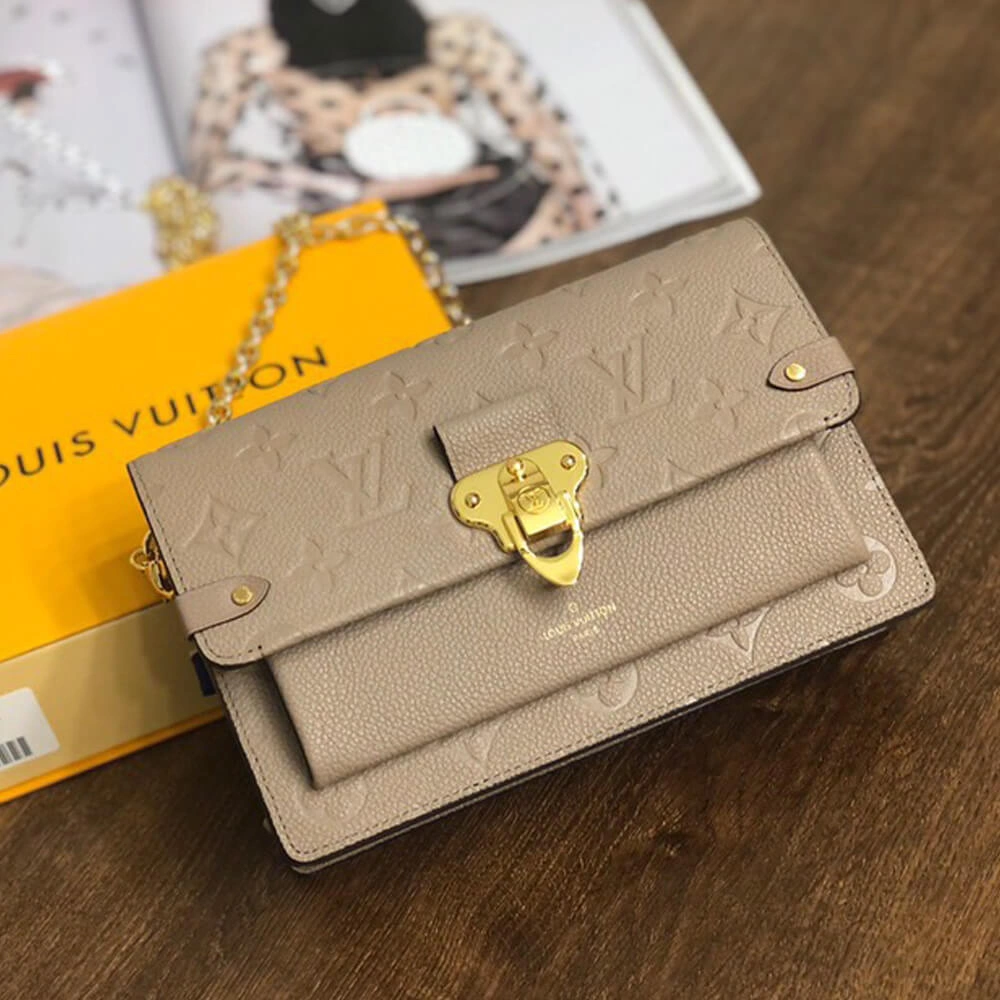 Louis Vuitton VAVIN CHAIN WALLET Snug 508