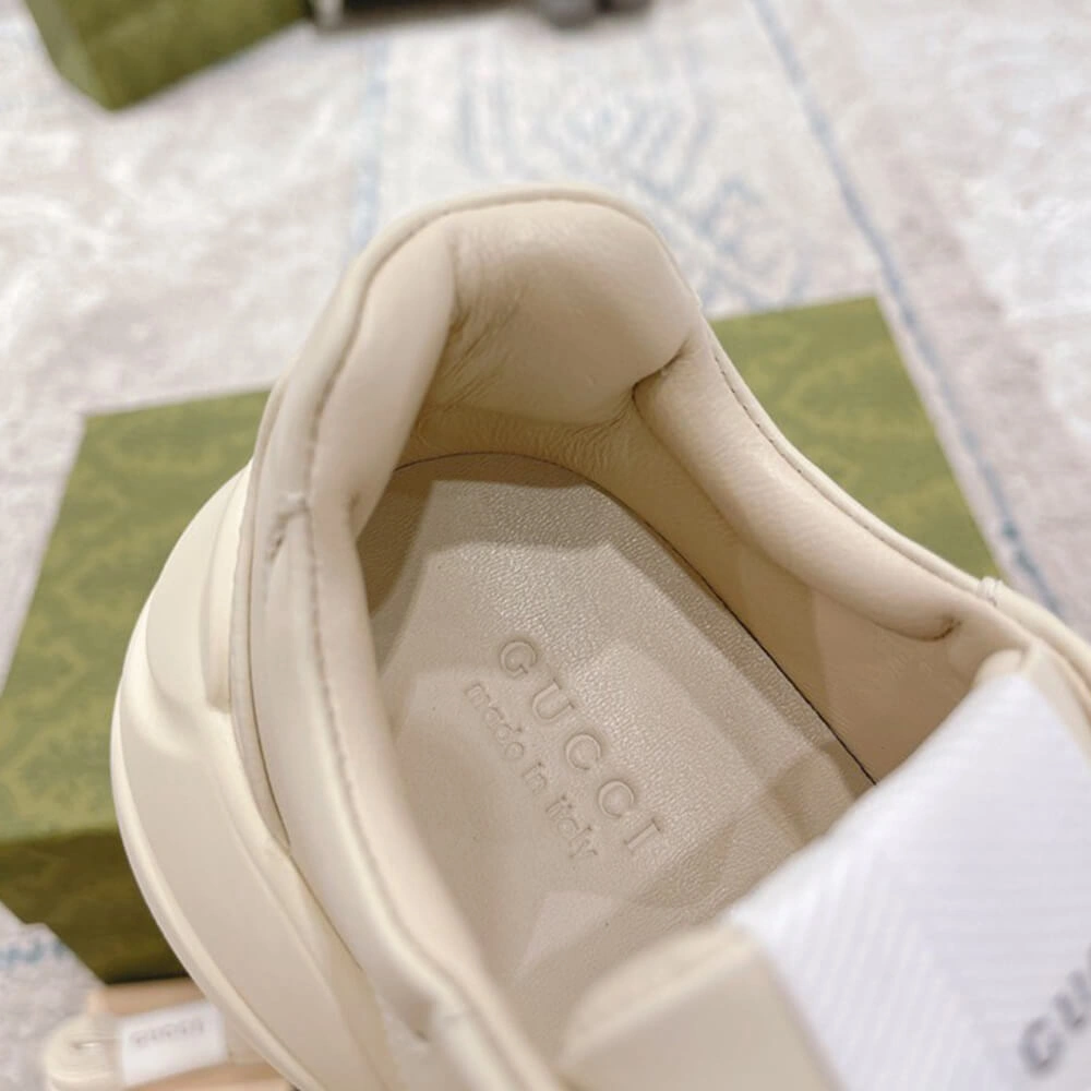 Packable Rhyton sneaker with cat print 54