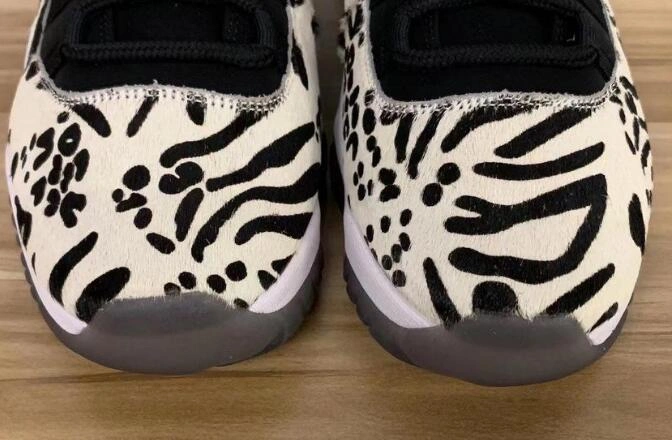 Air Jordan 11 Animal Instinct