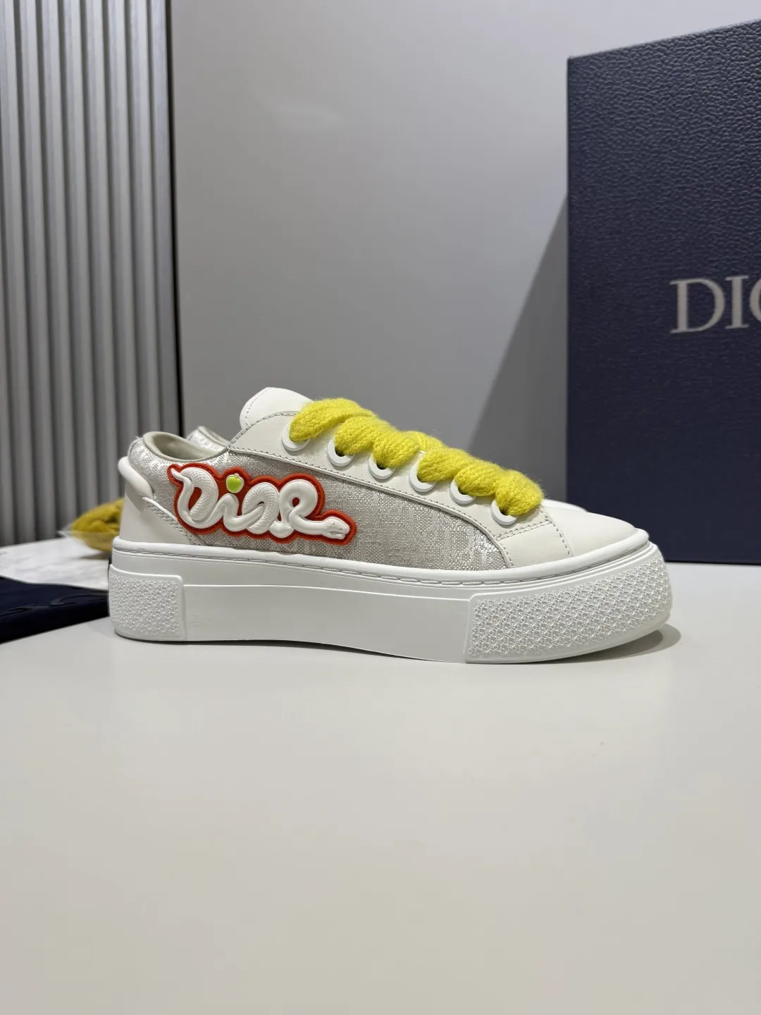 WrinkleFree Dior B33 Sneakers – White with Yellow Laces, Couples Edition, Best Rep Shoes,  Replica Dior 21