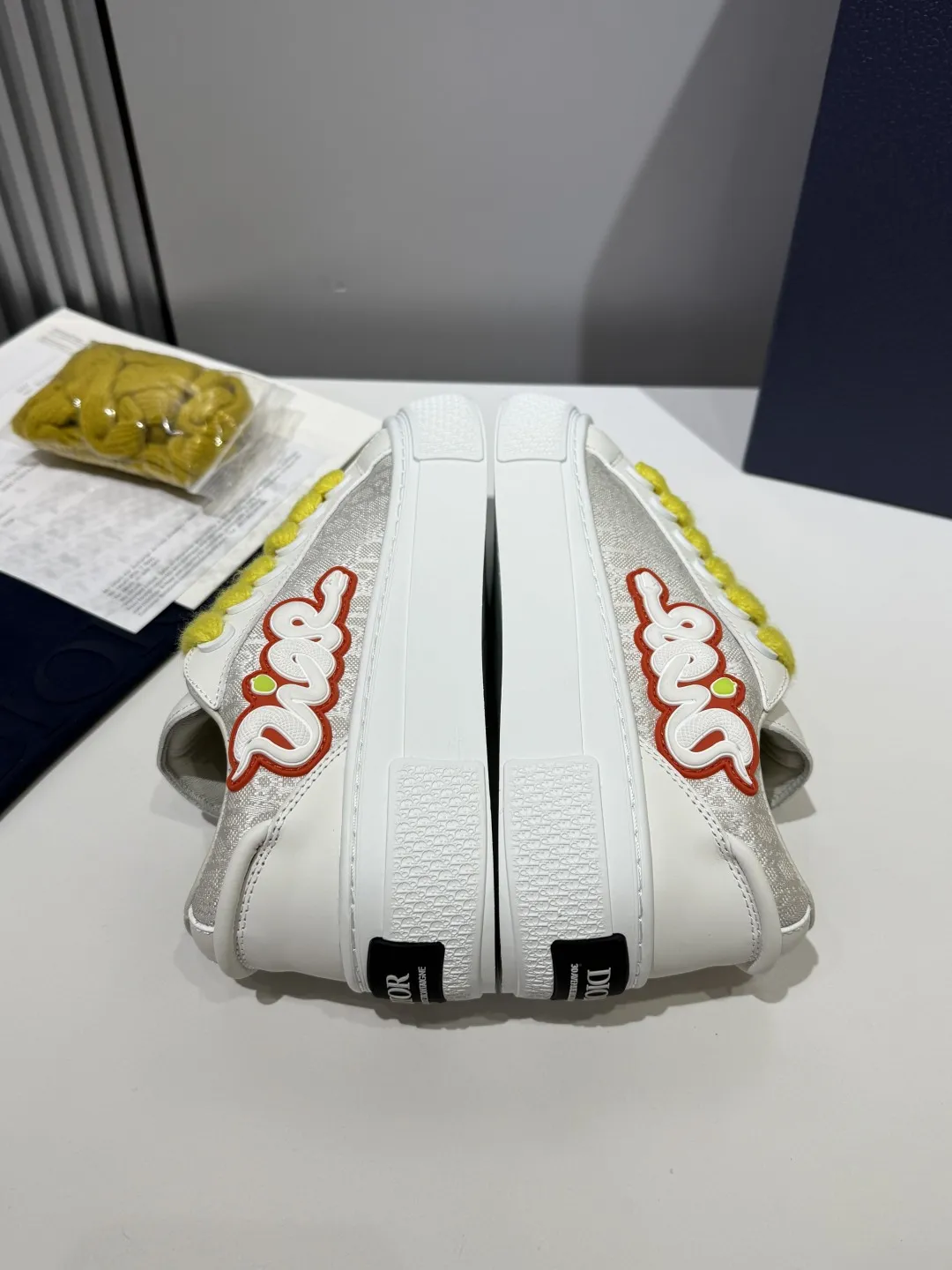 WrinkleFree Dior B33 Sneakers – White with Yellow Laces, Couples Edition, Best Rep Shoes,  Replica Dior 21