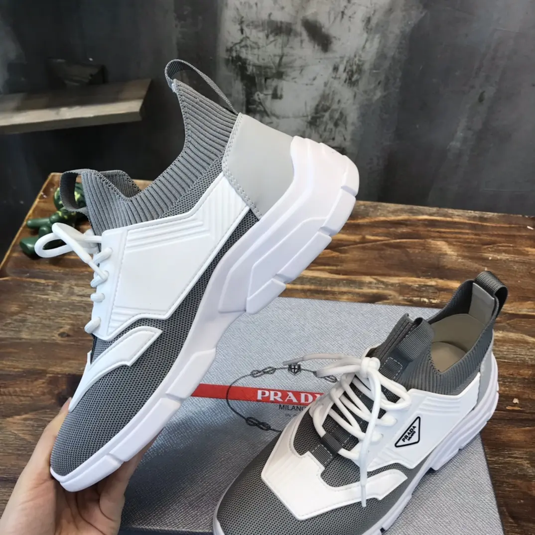 OdorResistant PRADA Men’s 2022 Grey and White Flyknit Sneakers – Replica Prada Edition, High Quality Prada Sneakers Replica, Sizes 38- 165