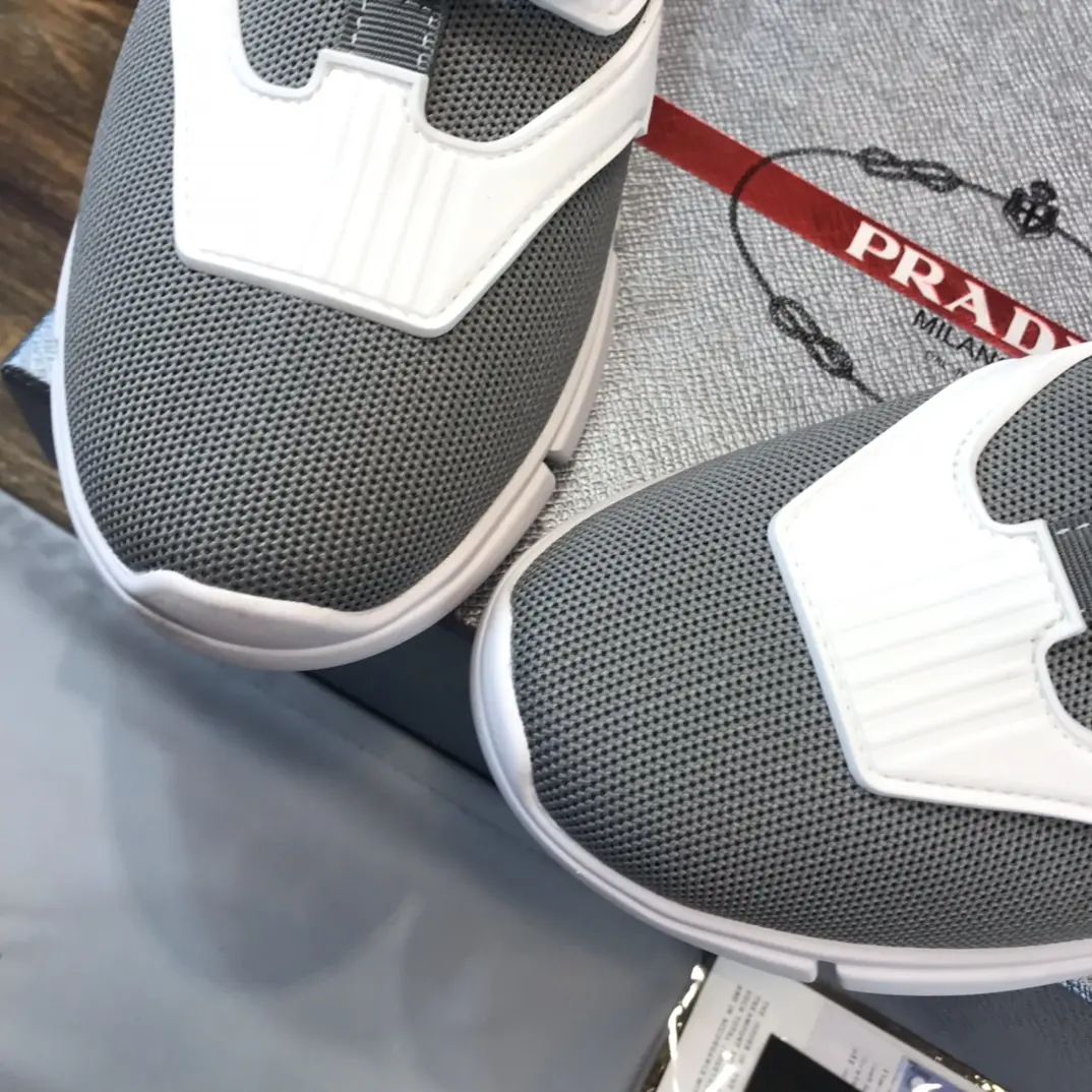 OdorResistant PRADA Men’s 2022 Grey and White Flyknit Sneakers – Replica Prada Edition, High Quality Prada Sneakers Replica, Sizes 38- 165