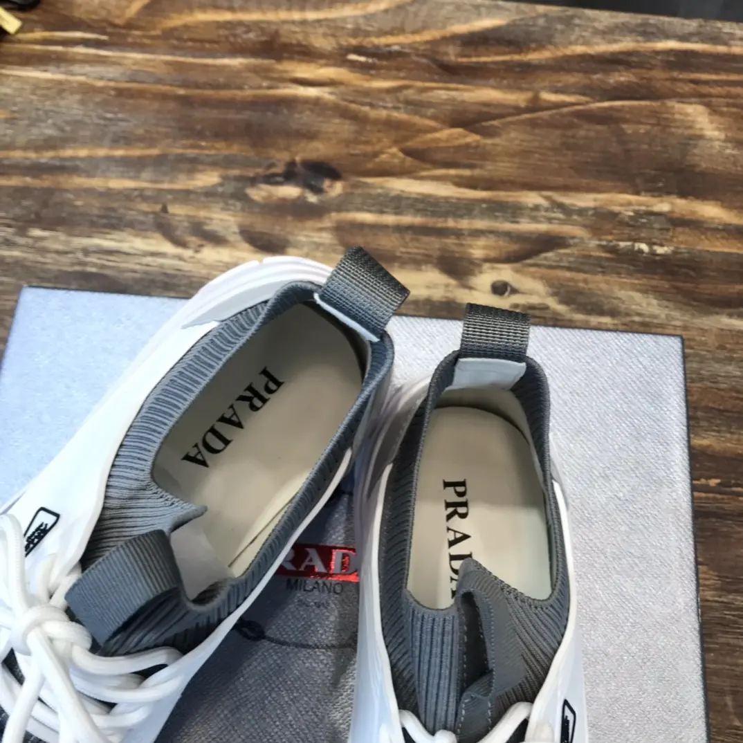 OdorResistant PRADA Men’s 2022 Grey and White Flyknit Sneakers – Replica Prada Edition, High Quality Prada Sneakers Replica, Sizes 38- 165