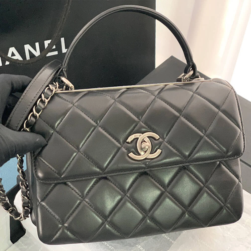 Sleek CHANEL FLAP BAG WITH TOP HANDLE 1695