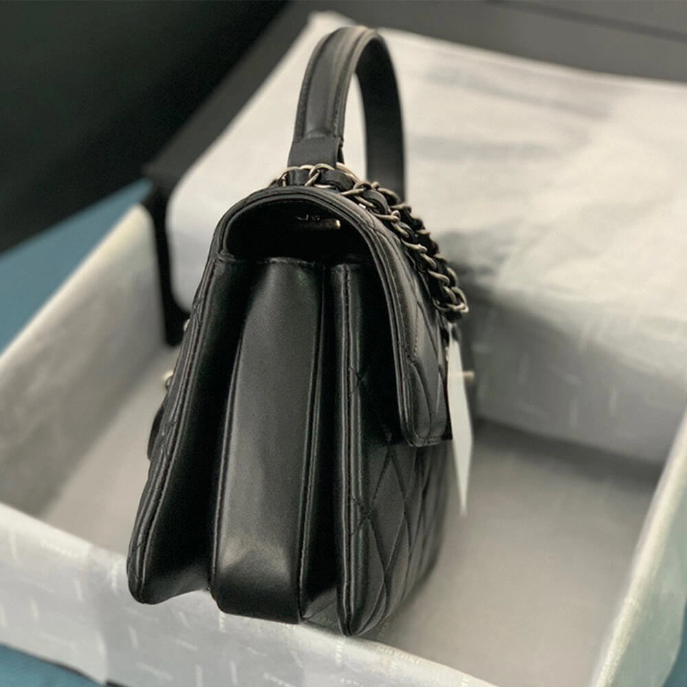 Sleek CHANEL FLAP BAG WITH TOP HANDLE 1695