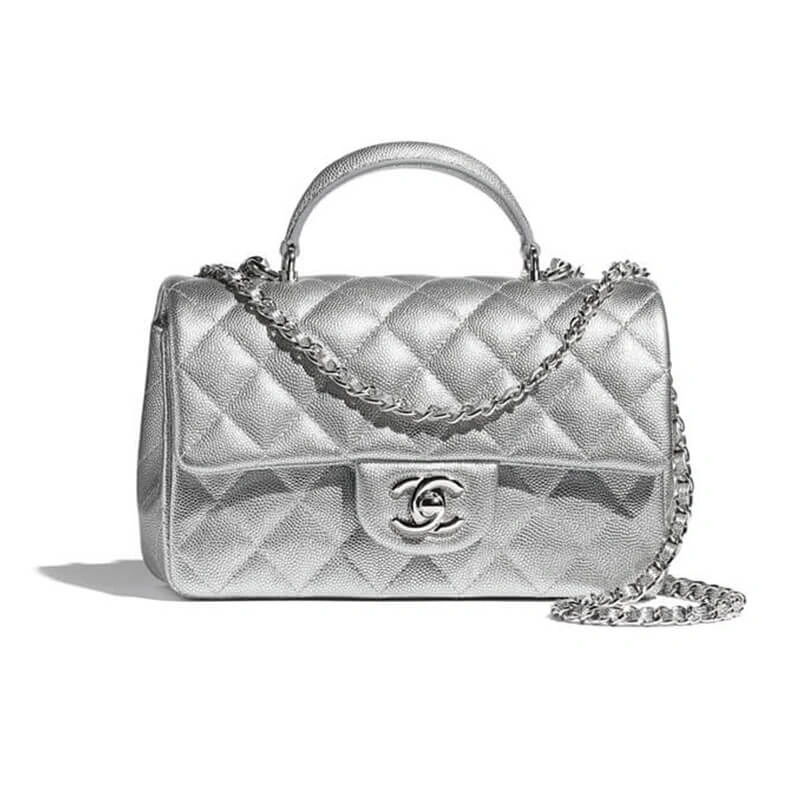 Sleek CHANEL Mini Flap Bag 1701