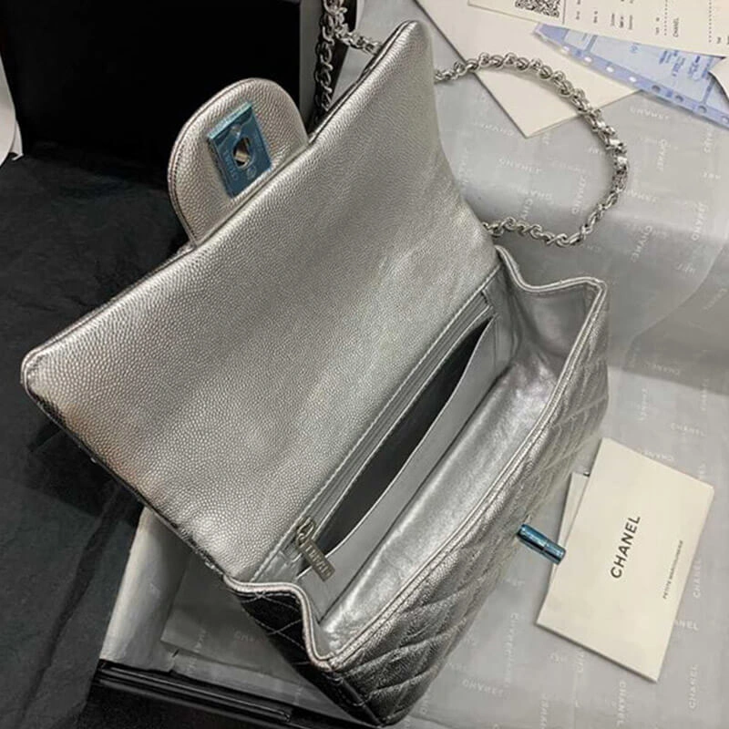 Sleek CHANEL Mini Flap Bag 1701