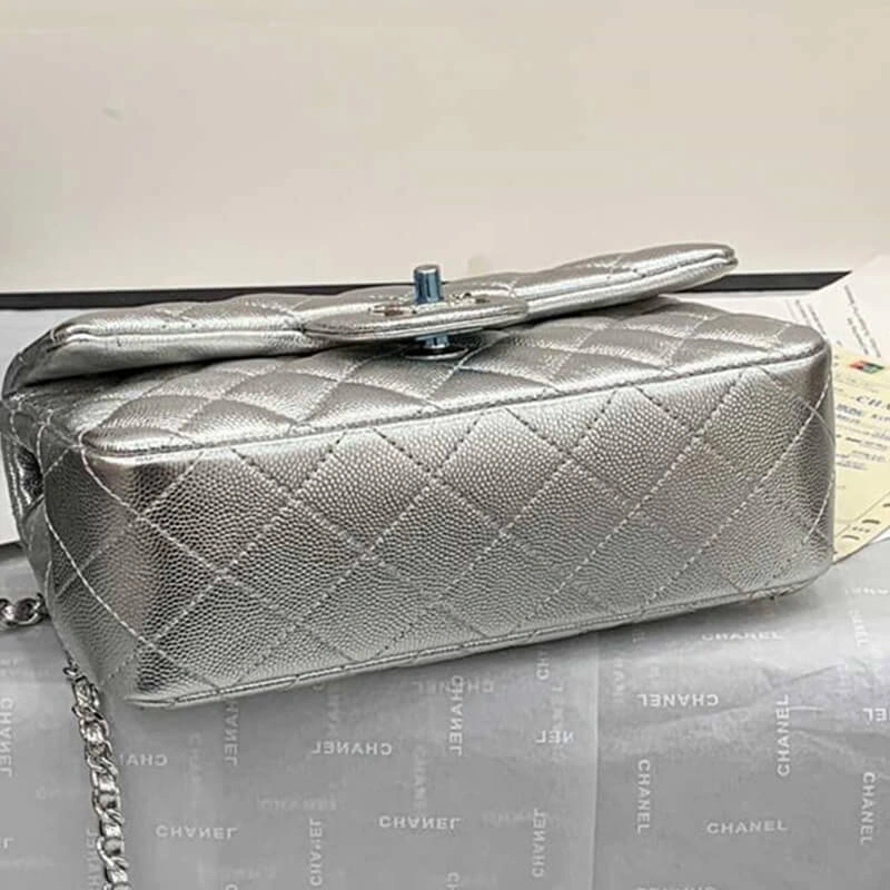 Sleek CHANEL Mini Flap Bag 1701