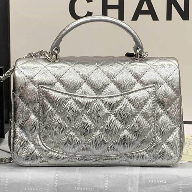 Sleek CHANEL Mini Flap Bag 1701