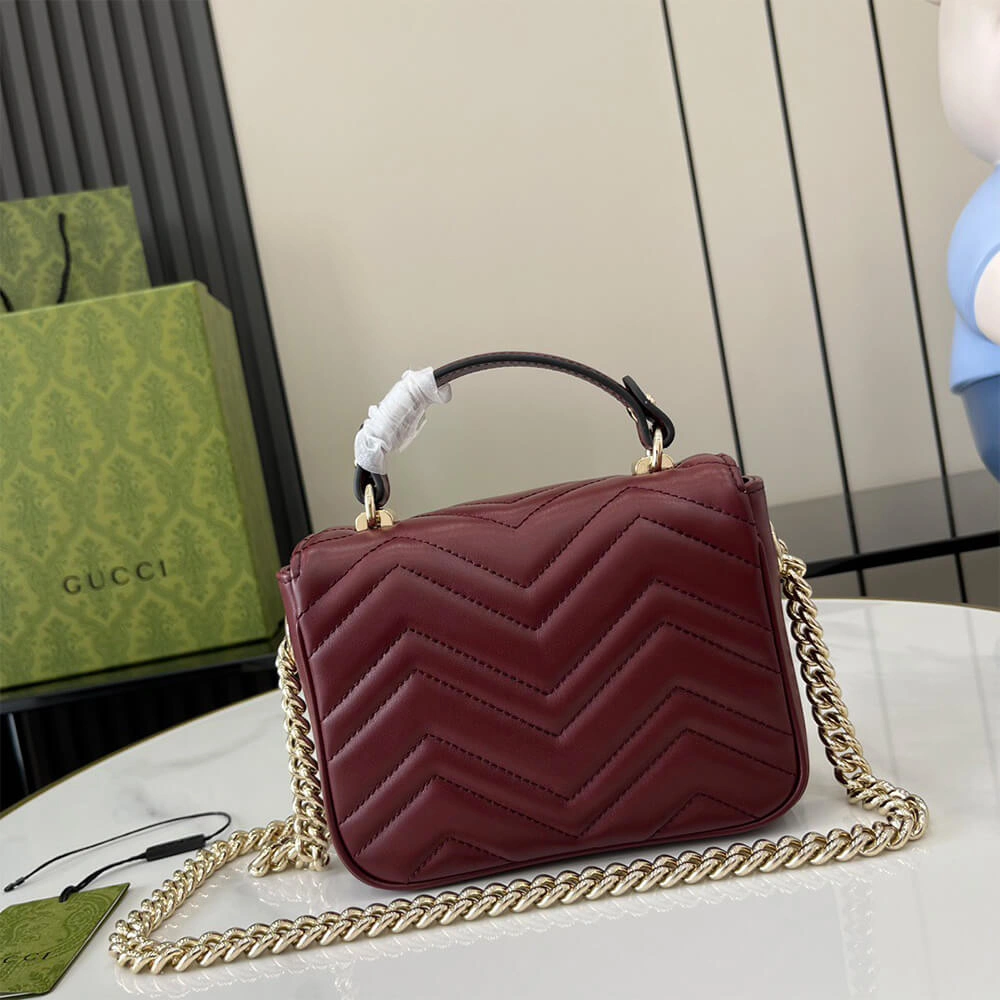 Stylish GG Marmont mini top handle bag 977