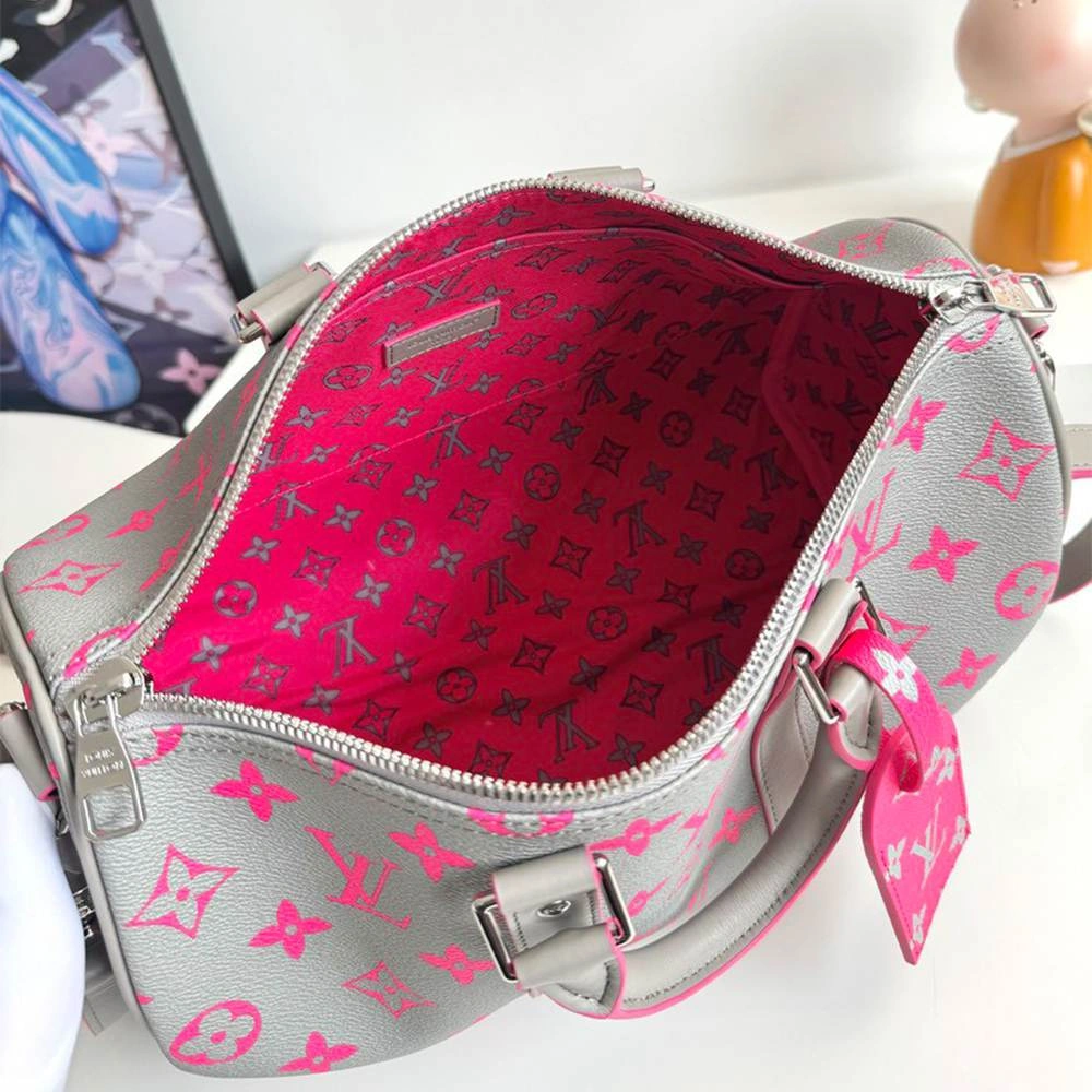 LV Keepall Bandoulière Snug 98