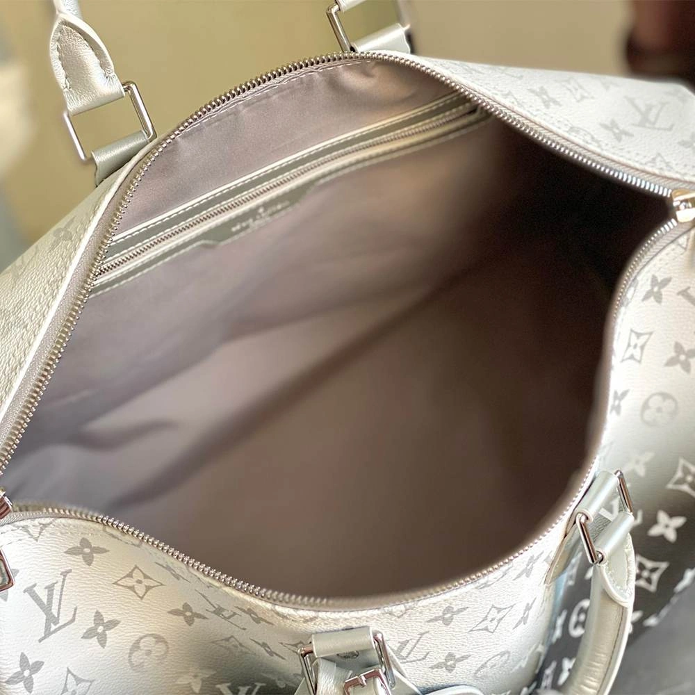 LV Keepall Bandoulière RelaxedFit 10
