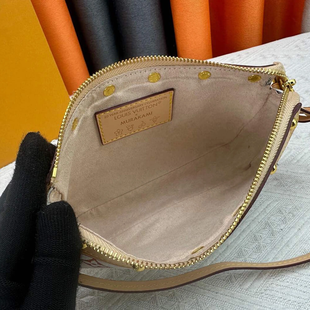 LV x TM Pochette Accessoires SoftTouch 503