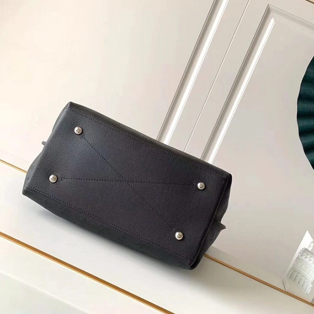 Louis Vuitton CARMEL Sleek 604