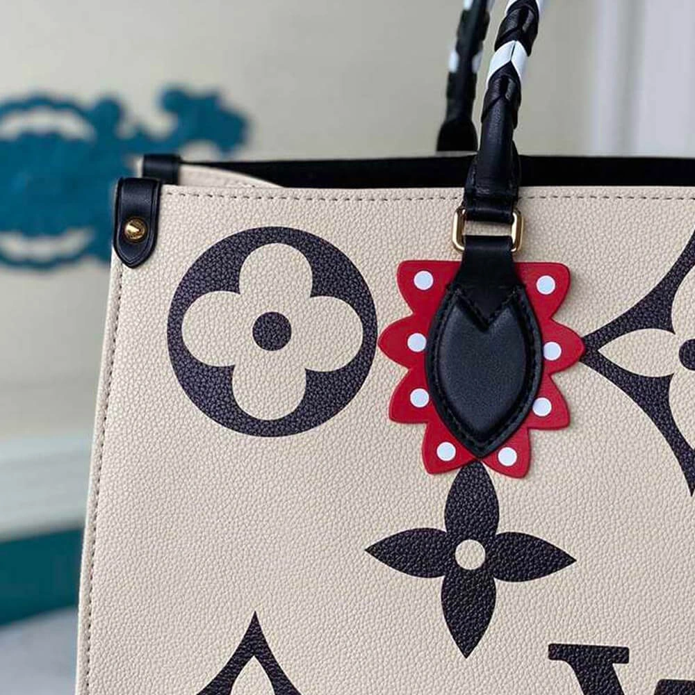 Flexible Louis Vuitton CRAFTY ONTHEGO GM 761