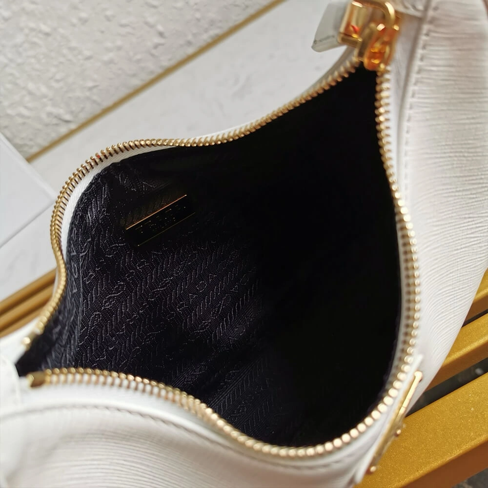 SunProtective Prada Re-Edition Saffiano leather mini bag 2972