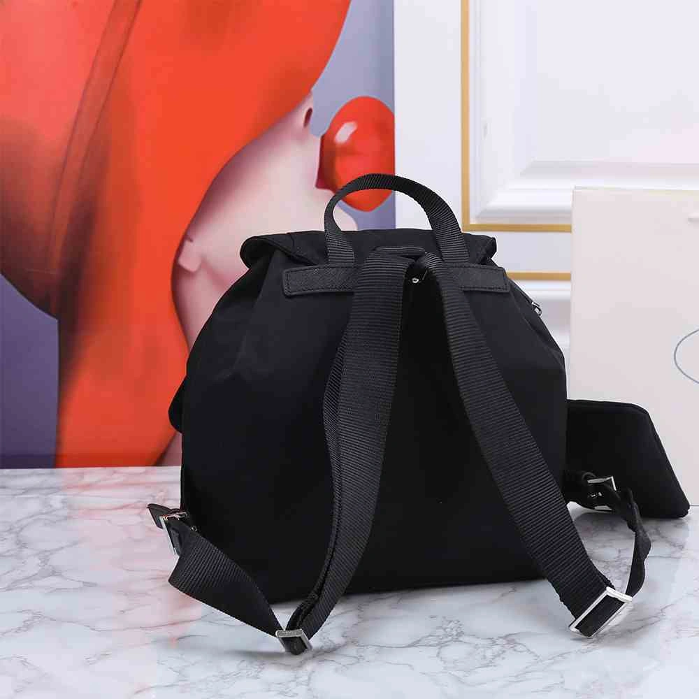 Effortless Prada Re-Nylon medium backpack with pouch 2961