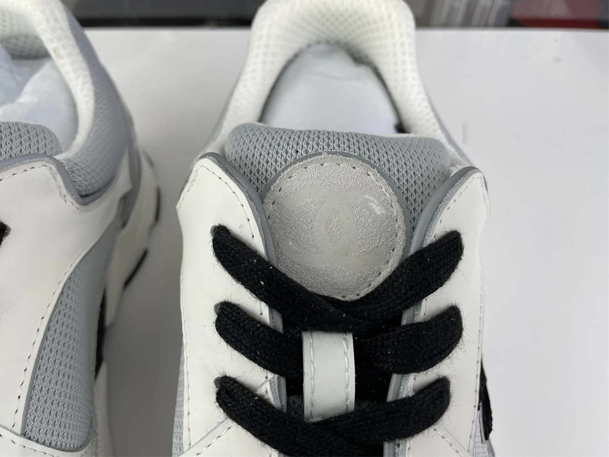 SportInspired CHANEL White sneakers with Black LOGO 1223
