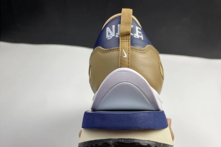 SportInspired sacai x Nike VaporWaffle Sesame Blue Void DD1875-200 1157