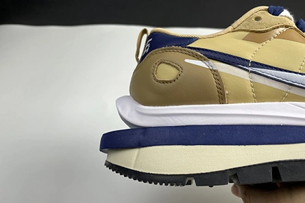 SportInspired sacai x Nike VaporWaffle Sesame Blue Void DD1875-200 1157