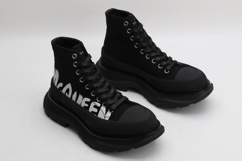 ALEX MCQ TREAD SLICK BOOT IN BLACK WITH LETTERS