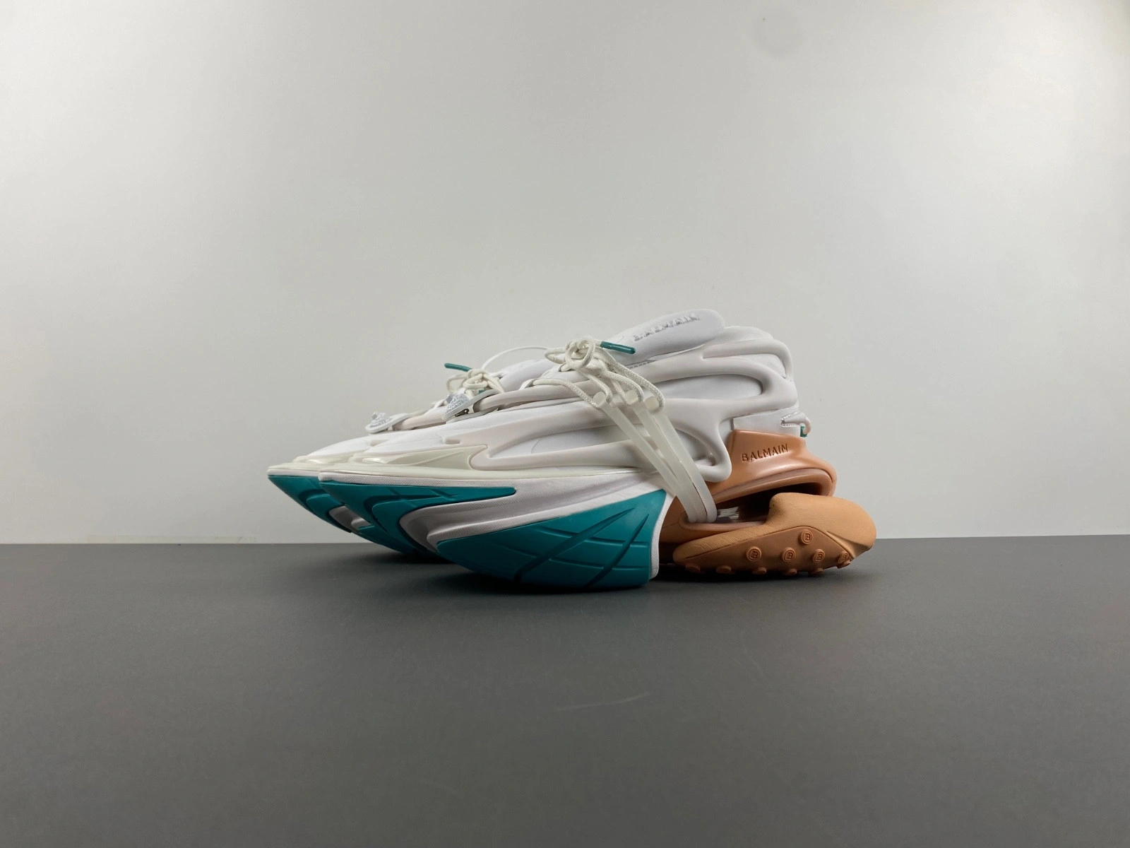BALMAIN NEOPRENE AND LEATHER UNICORN LOW-TOP SNEAKERS