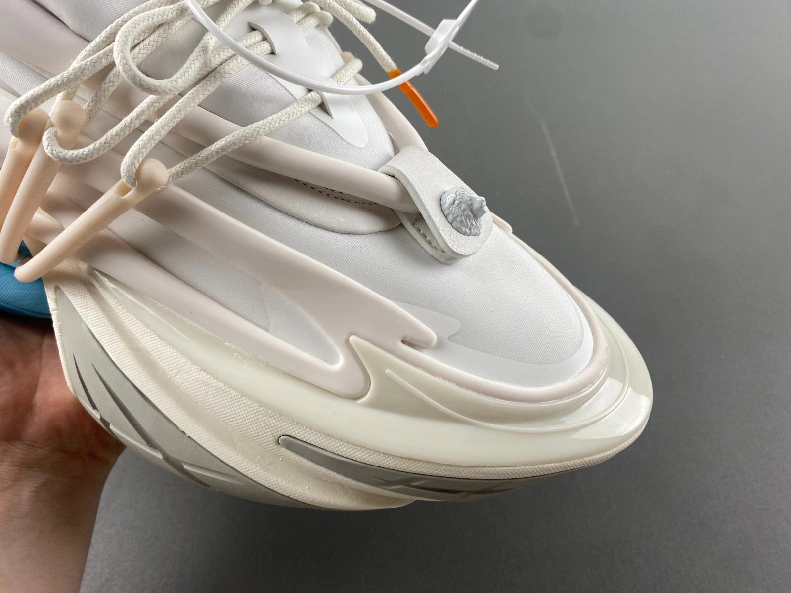 BALMAIN NEOPRENE AND LEATHER UNICORN LOW-TOP SNEAKERS
