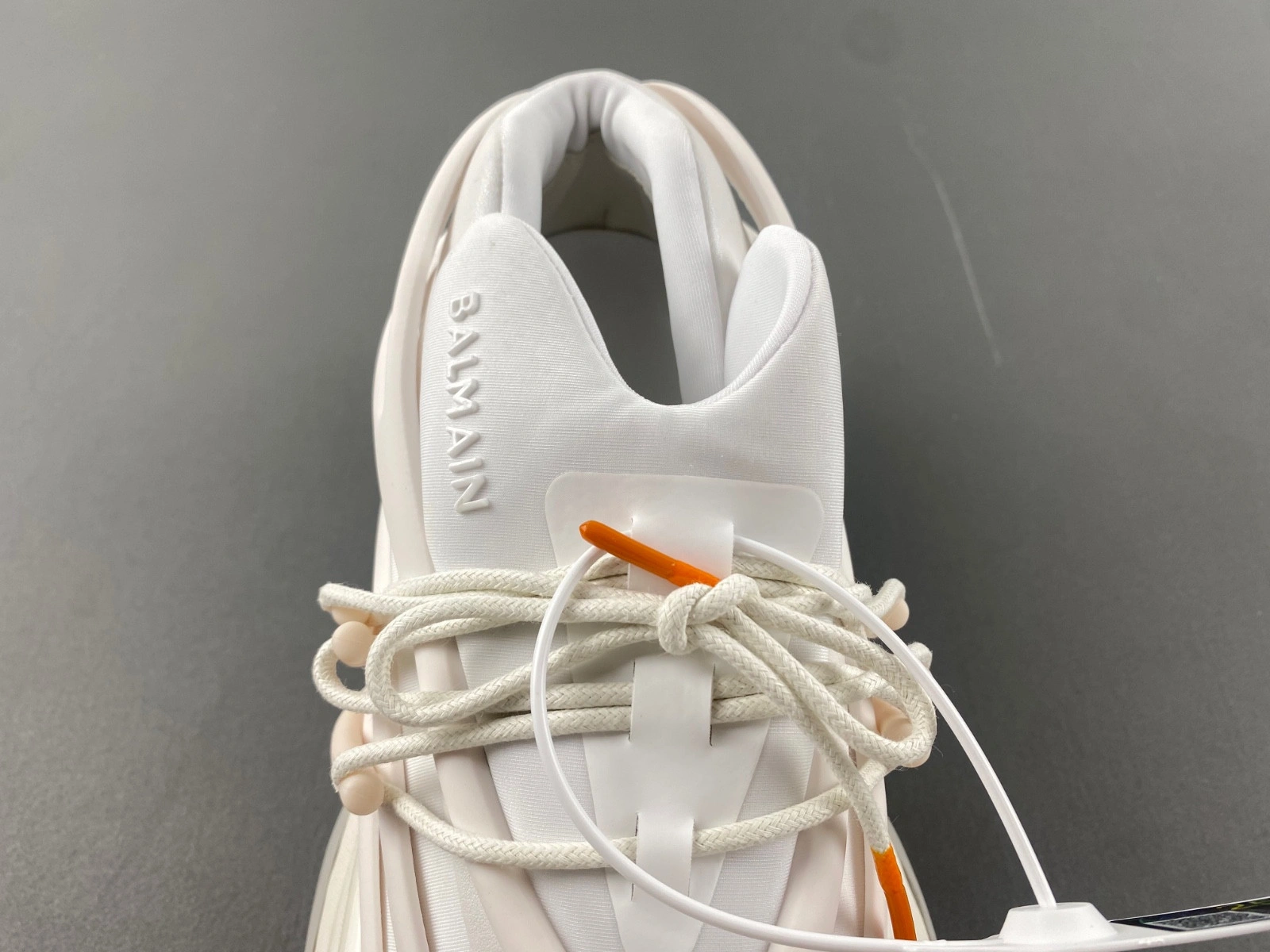 BALMAIN NEOPRENE AND LEATHER UNICORN LOW-TOP SNEAKERS