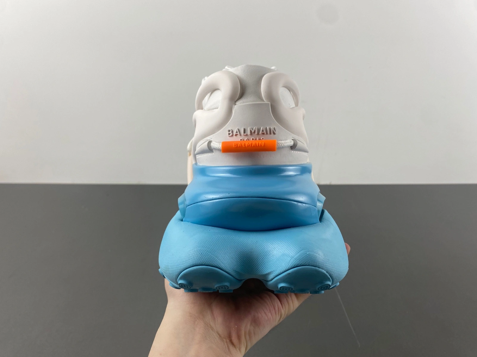 BALMAIN NEOPRENE AND LEATHER UNICORN LOW-TOP SNEAKERS