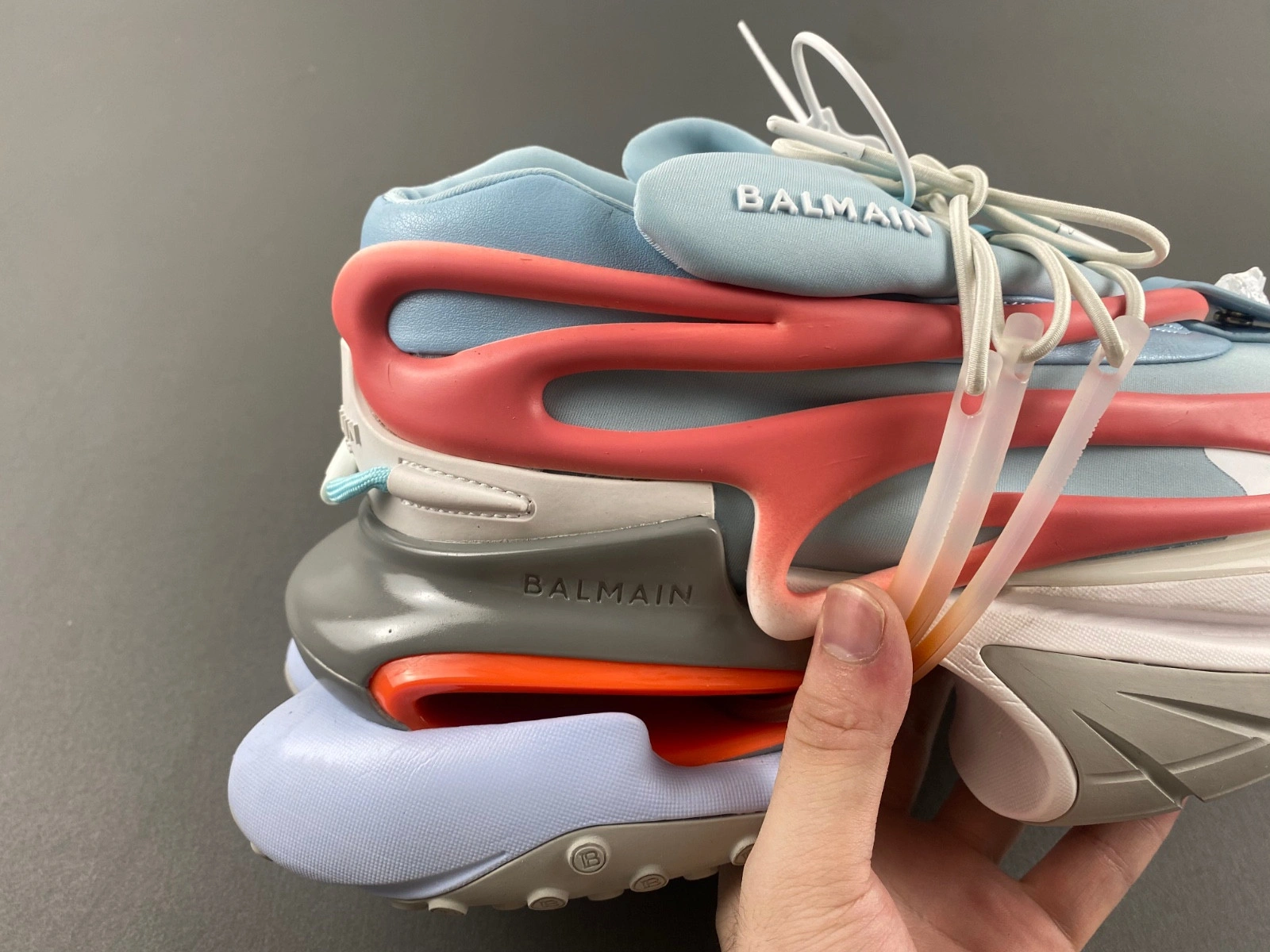 BALMAIN NEOPRENE AND LEATHER UNICORN LOW-TOP SNEAKERS