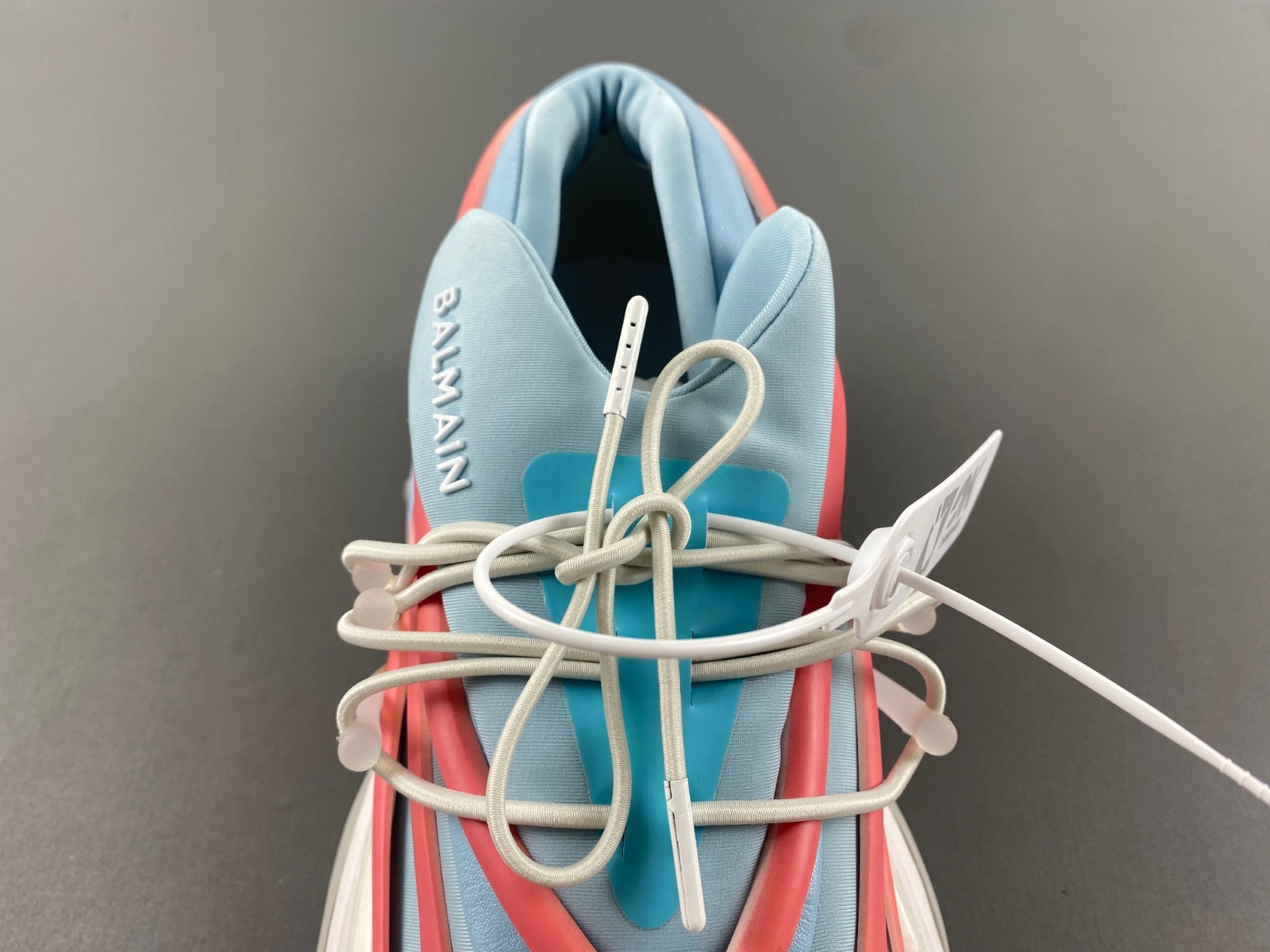 BALMAIN NEOPRENE AND LEATHER UNICORN LOW-TOP SNEAKERS