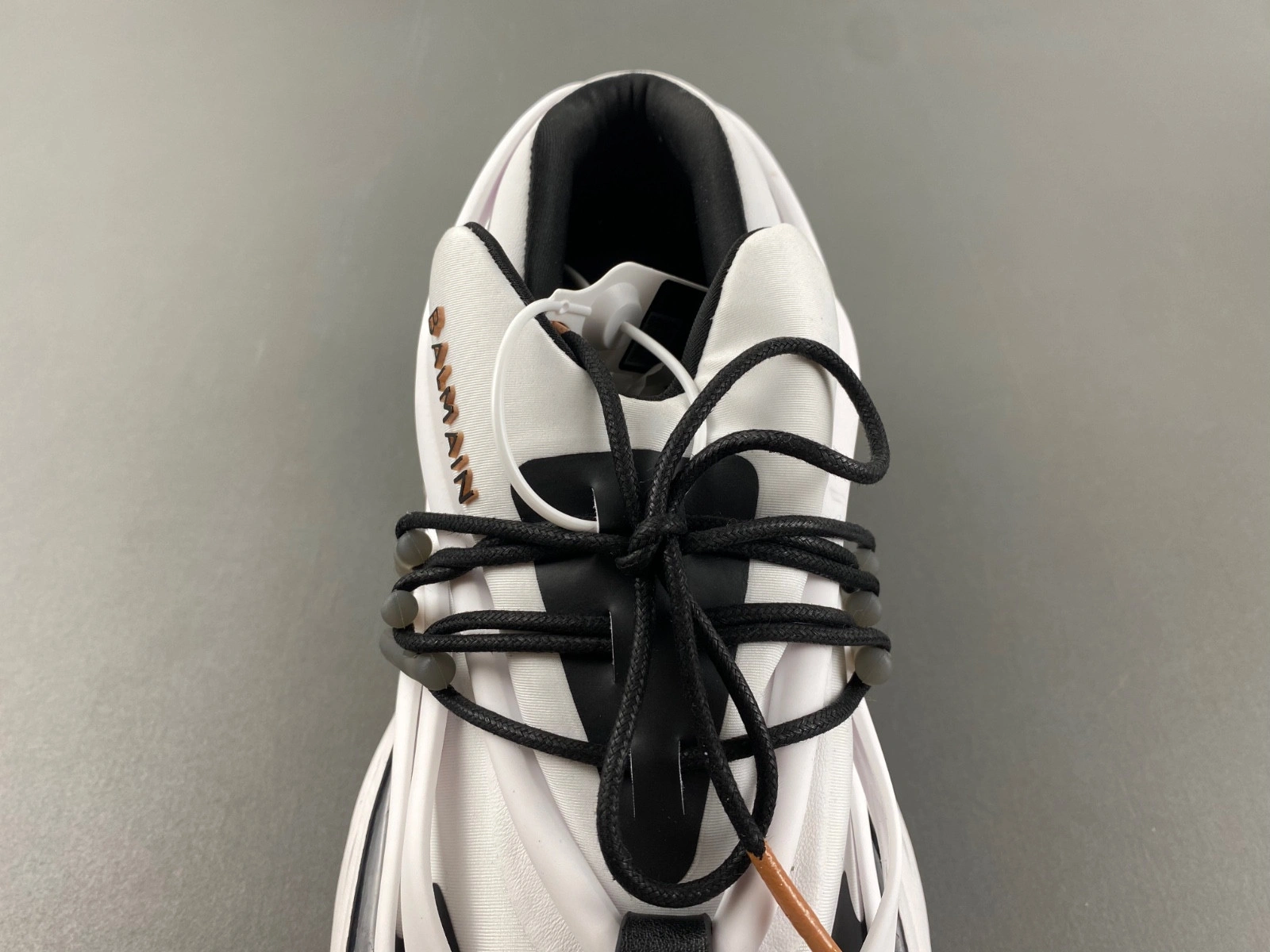 BALMAIN NEOPRENE AND LEATHER UNICORN LOW-TOP SNEAKERS