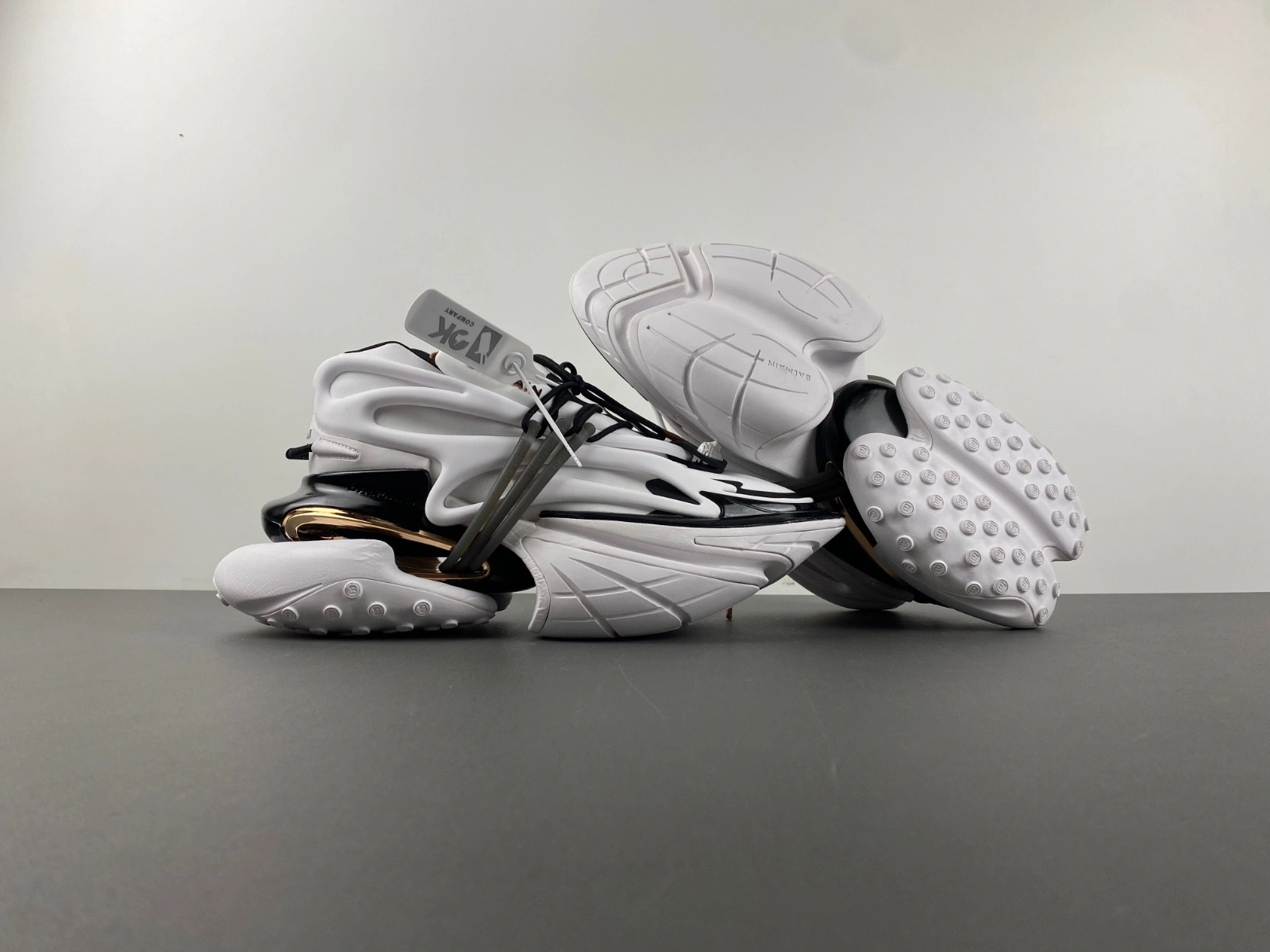 BALMAIN NEOPRENE AND LEATHER UNICORN LOW-TOP SNEAKERS