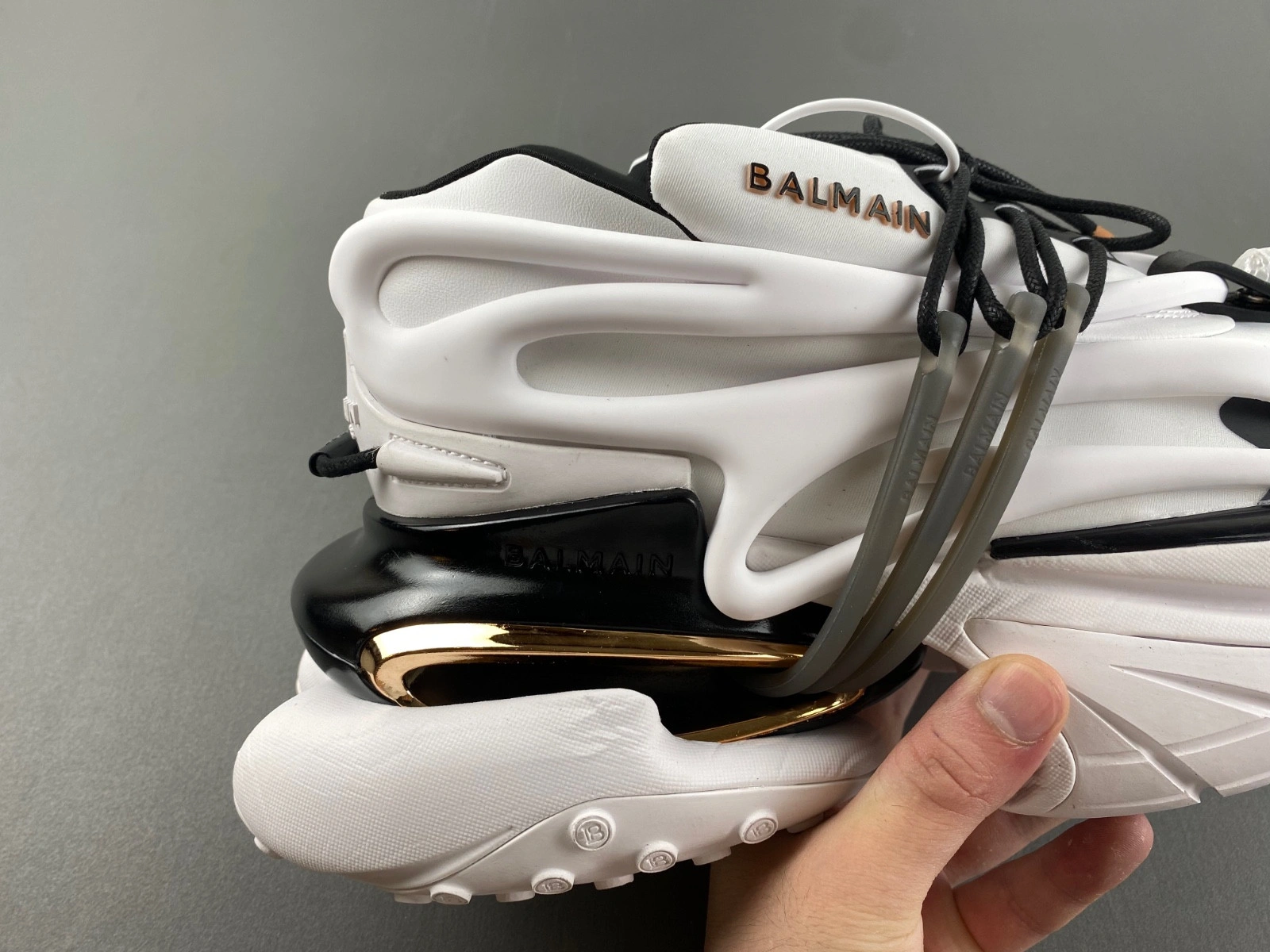 BALMAIN NEOPRENE AND LEATHER UNICORN LOW-TOP SNEAKERS