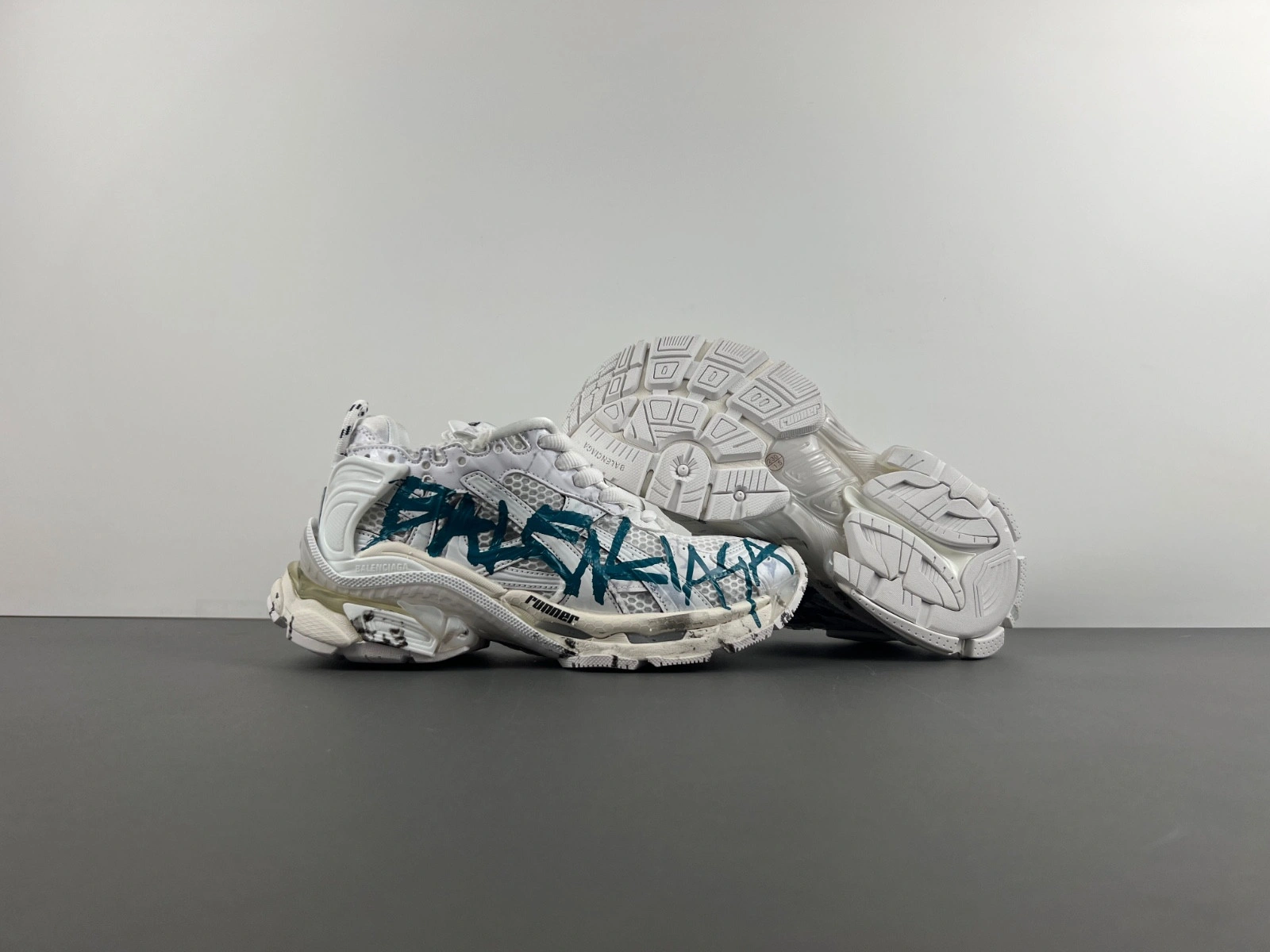 Balenciaga   Runner Graffiti Sneaker in White blue