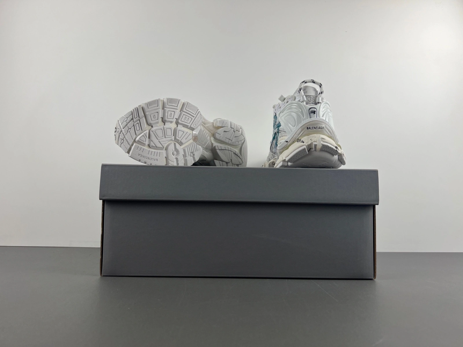 Balenciaga   Runner Graffiti Sneaker in White blue