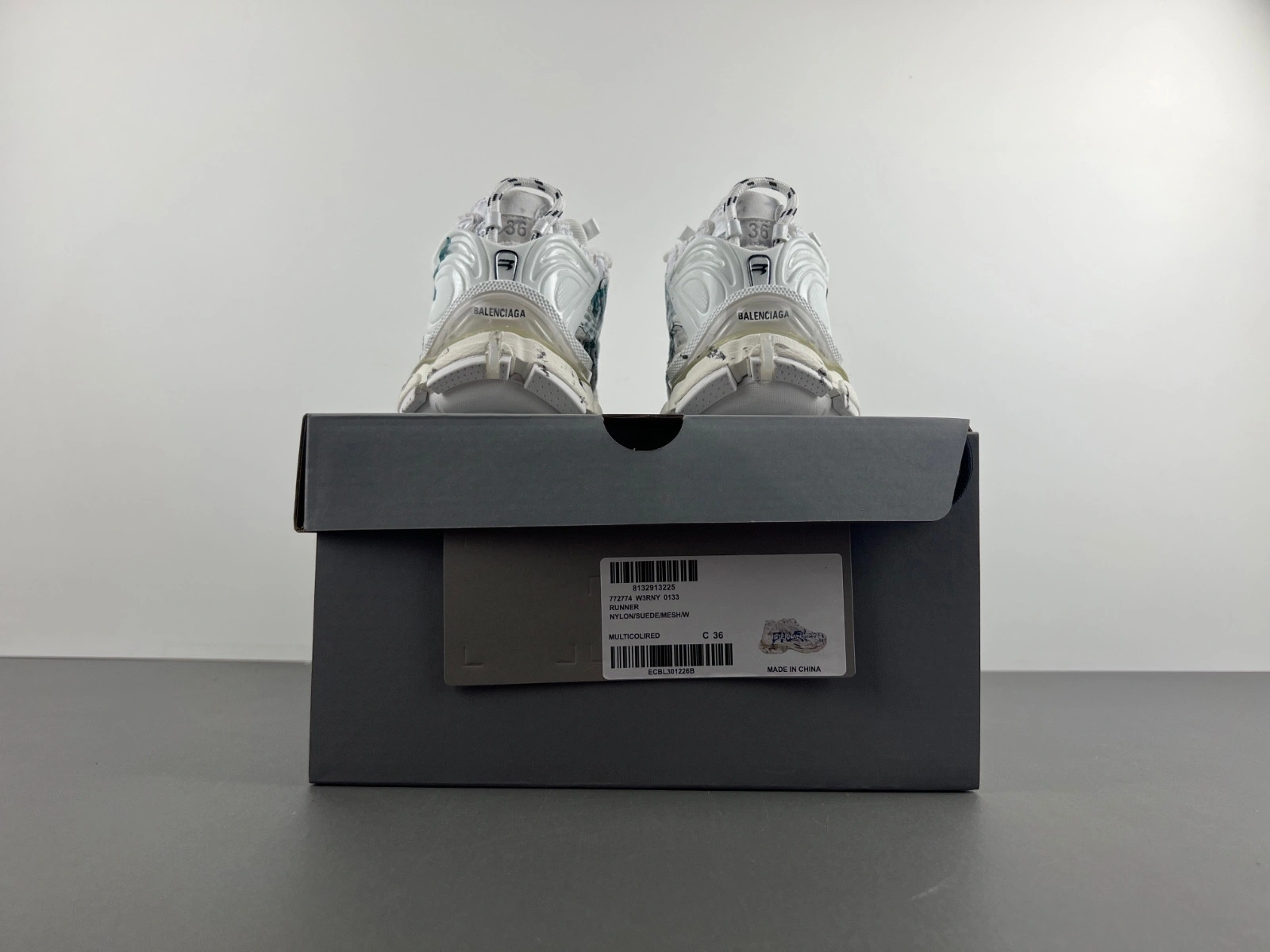 Balenciaga   Runner Graffiti Sneaker in White blue