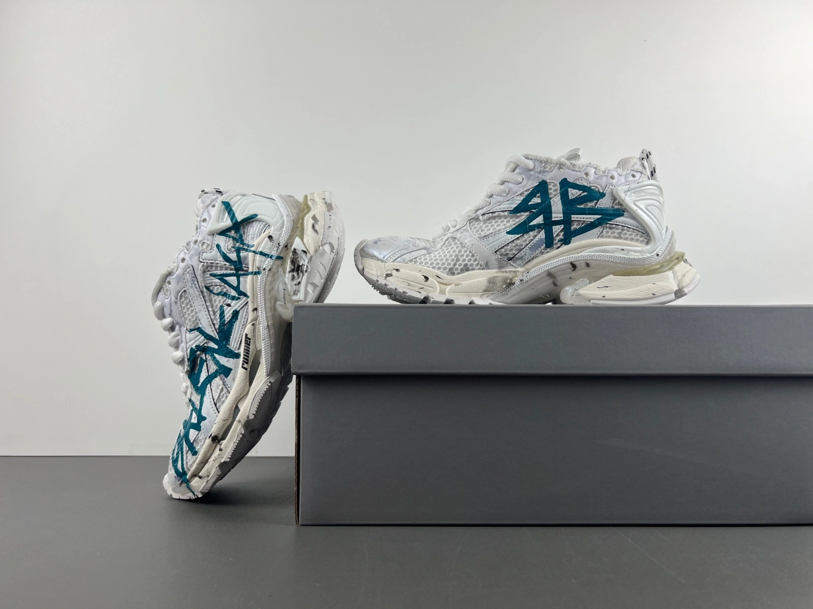 Balenciaga   Runner Graffiti Sneaker in White blue