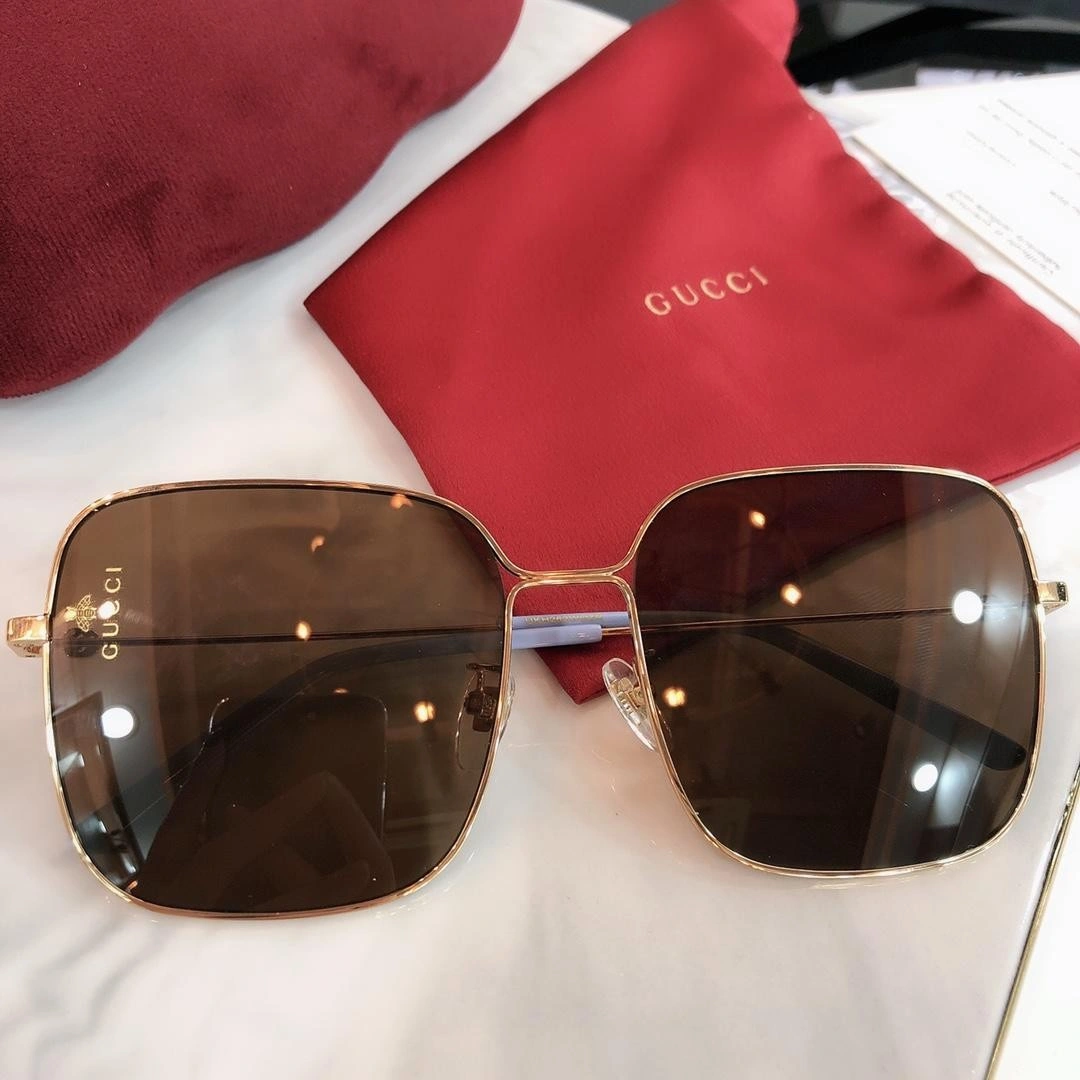 Gucci Rectangular-frame metal sunglasses 541368