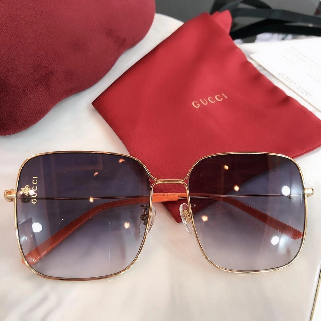 Gucci Rectangular-frame metal sunglasses 541368