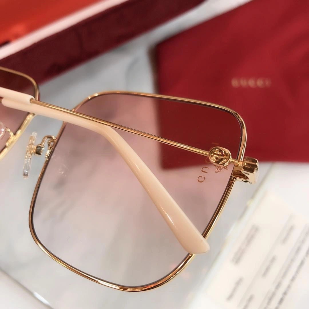 Gucci Rectangular-frame metal sunglasses 541368